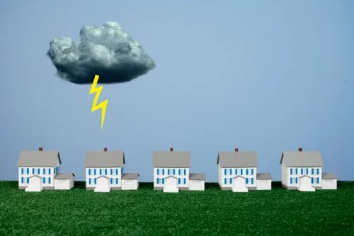 Lighting strikes one house in a row of 5